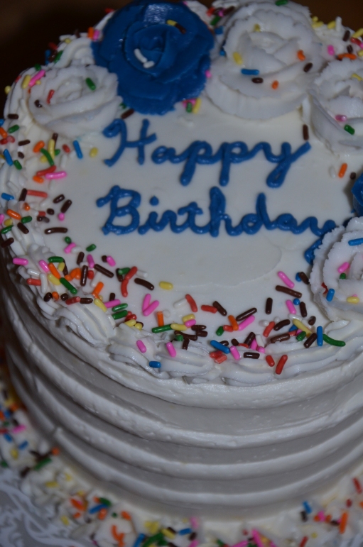 Gluten-free confetti cake with soft and fluffy gluten-free cream cheese frosting.