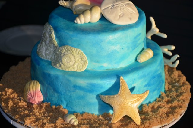 Under the Sea: By Grace Cakes bakery original, gluten free cake. Butter vanilla sponge covered in handpainted marshmallow fondant.  